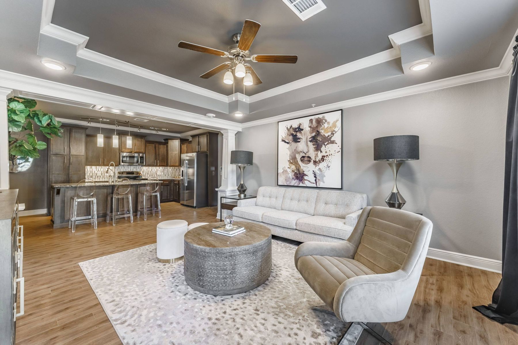 Luxury apartment kitchen with stainless steel appliances, granite countertops, and lots of storage space